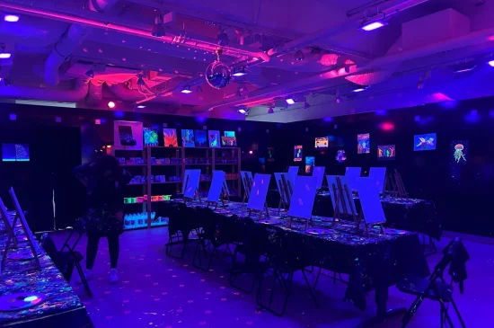 Rembrandt van Wine neon painting studio in Amsterdam with easels and blacklight
